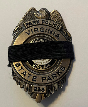 Insignia de guardabosques de las fuerzas del orden